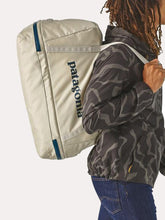 Duffle bag, patagonia bag, pelican, zipper bottom for separating items, planing duffle