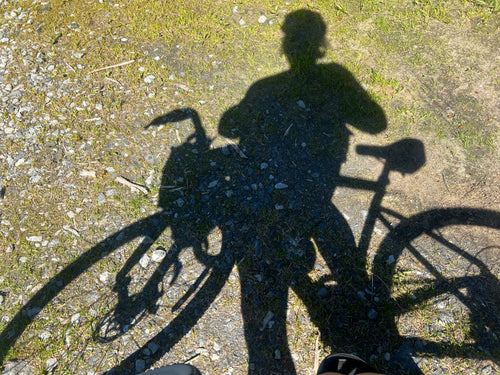 Shadow image of a bike and rider