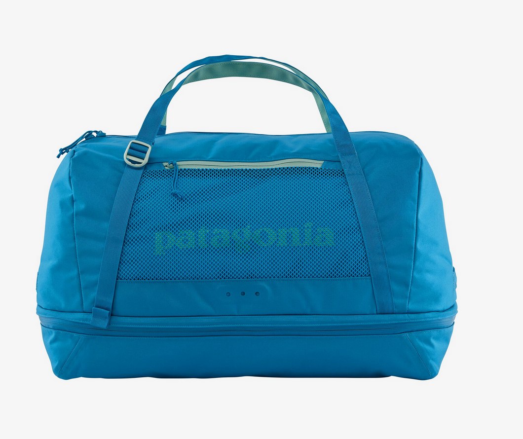 Duffle bag, patagonia bag, blue, zipper bottom for separating items, carry on back, cordova gear alaska